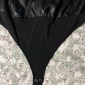 Black Vegan Leather sleeveless bodysuit. Good American.